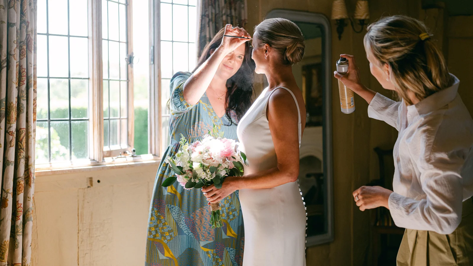 Bride with elegantly styled hair on her wedding morning