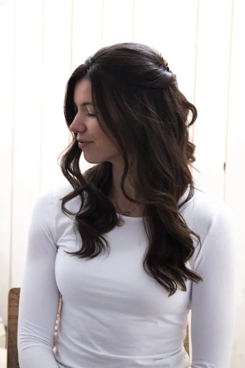 Half pinned up with a loose soft curl for a Cotswold bride 