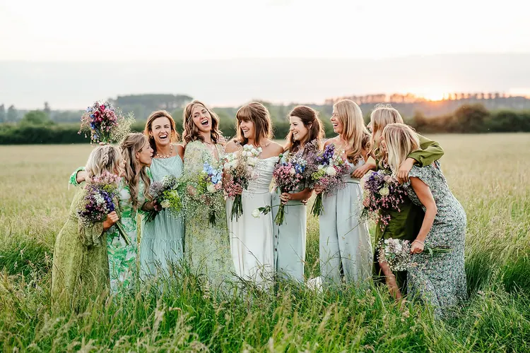 Bride and bridesmaids in a countryside wedding photograph